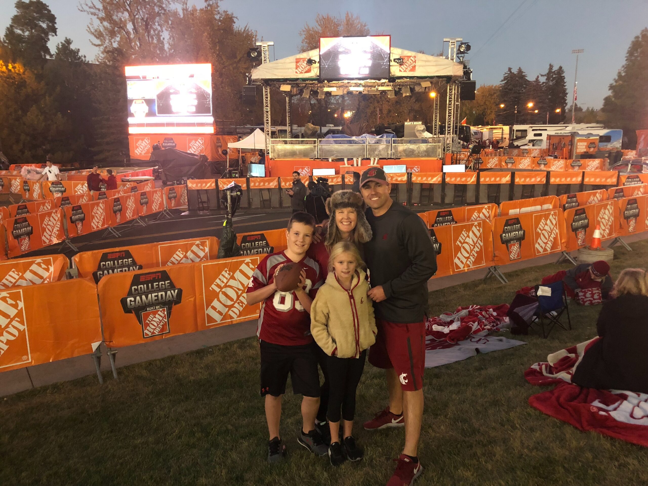 Family posing at ESPN College GameDay stage